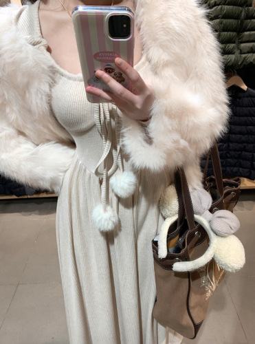 Actual shot of Gentle Sister’s vertical short fur coat + bonus knitted mid-length fur ball dress