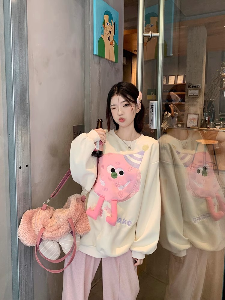天貓品質可愛卡通休閒長袖衛衣女裝早秋寬鬆顯瘦甜美減齡套頭上衣