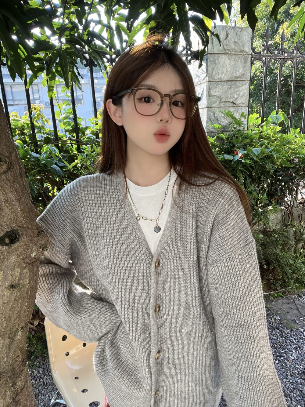 Real shot of three standard loose and lazy single-breasted V-neck solid color cardigan sweater jacket