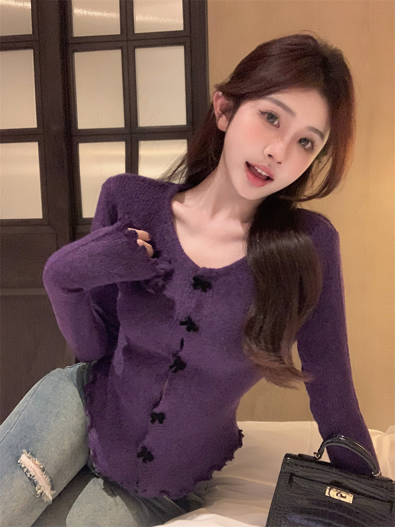 Actual shot of designer earring sweater with bow button top and slim bottoming shirt
