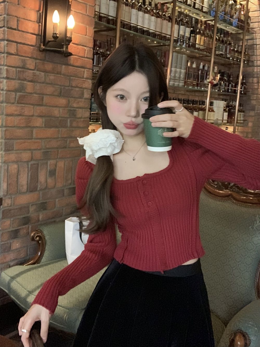 Real shot of three standard Christmas and New Year outfits for women in red square-neck sweaters