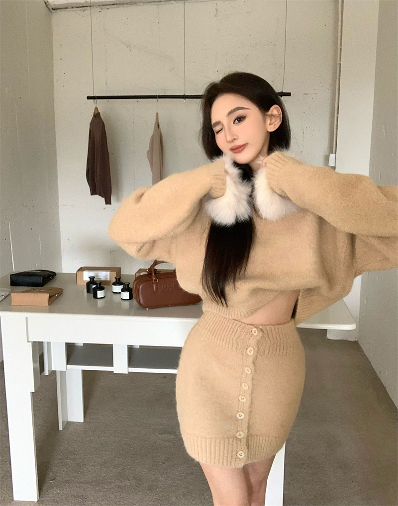 Real shot of hot girl with retro temperament in short knitted sweater top and high waist skirt suit