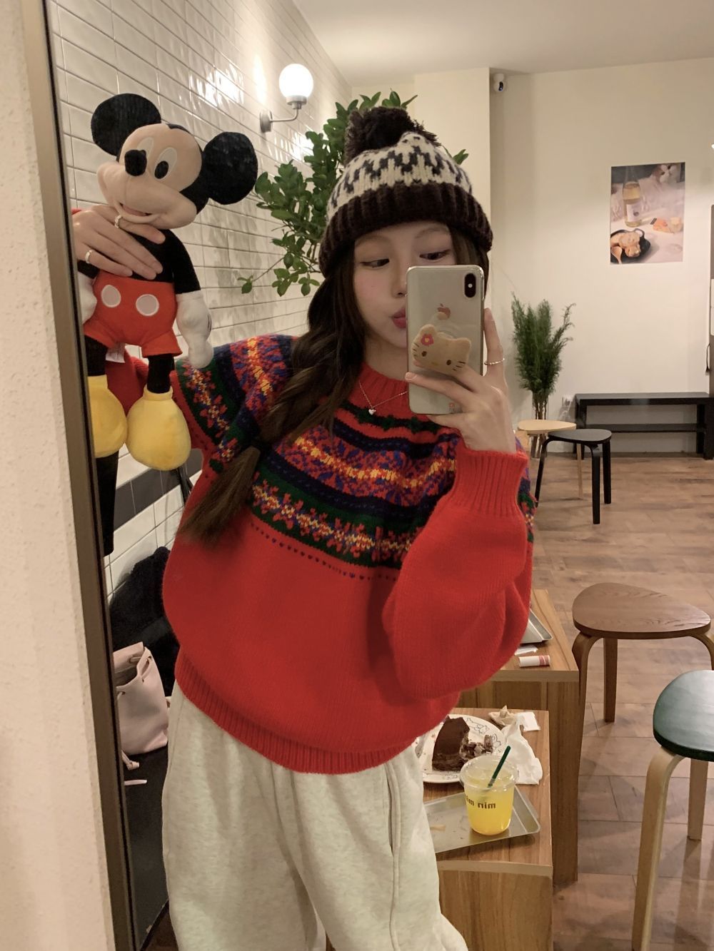 Actual shot of three standard atmospheric jacquard contrasting round neck pullover sweaters for women