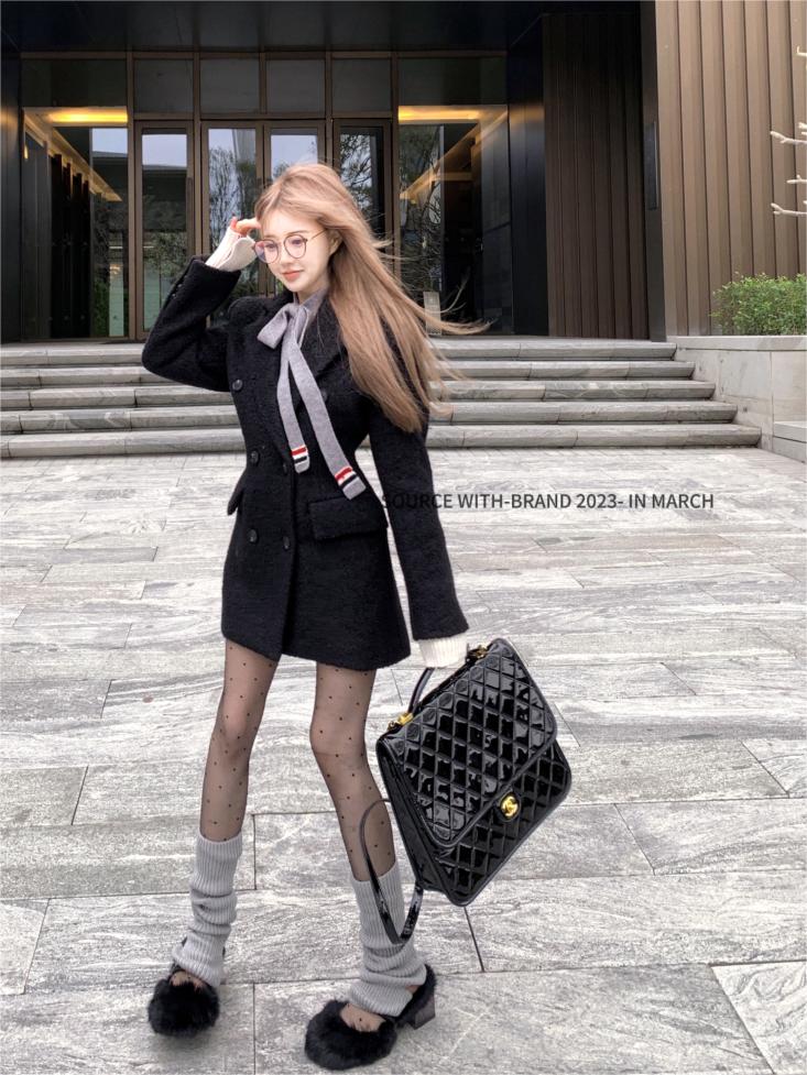 Actual shot of a double-breasted wool coat + slim knitted single-breasted top that captures the atmosphere and temperament during the Chinese New Year