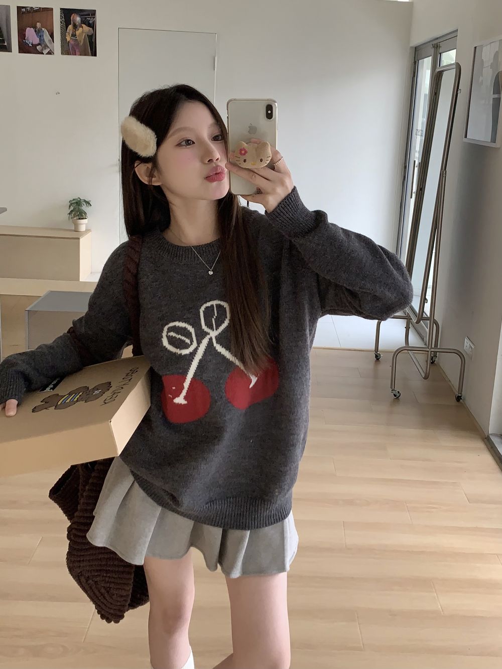 Actual shot of three standard retro sweet and soft sweaters with alienating design tops