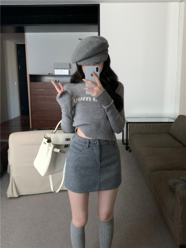 Real shot of round neck pullover short letter sweater with knitted sweater top and woolen skirt suit