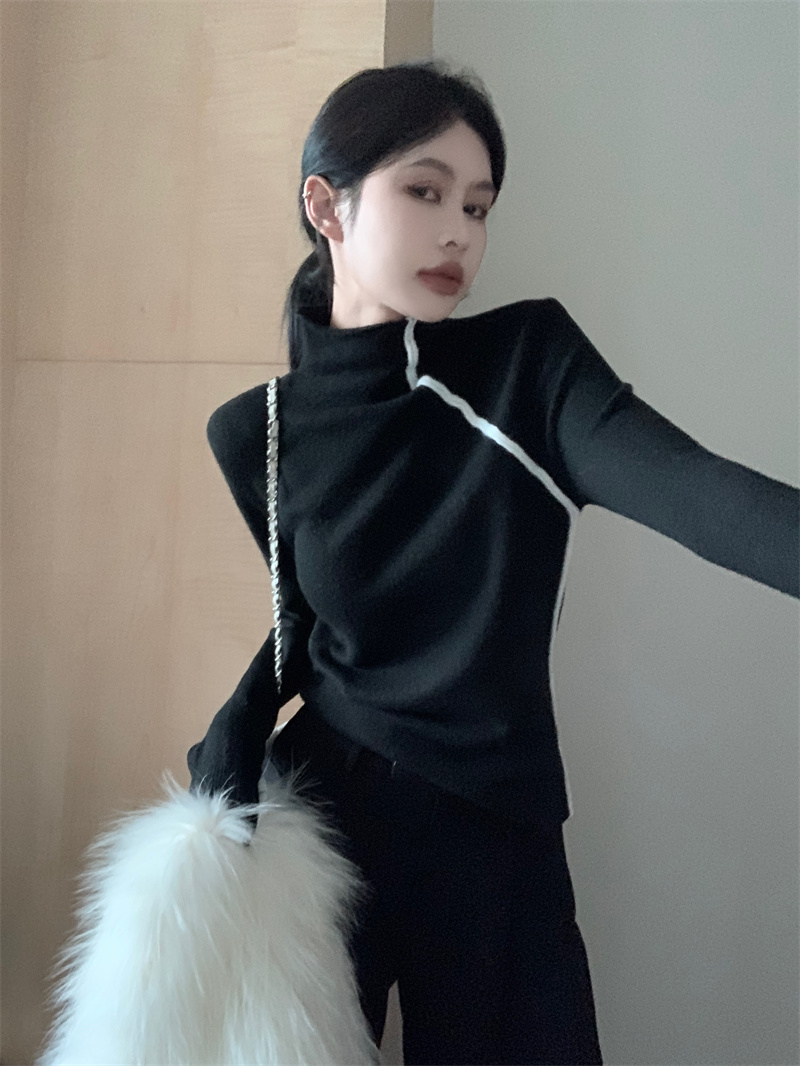 Actual shot of contrasting color turtleneck sweater with a niche design and a base layer top