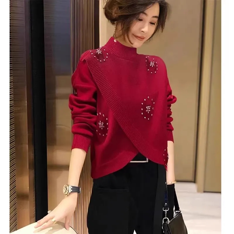 天貓質量交叉短款長袖毛衣女秋冬時尚半高領寬鬆百搭針織衫潮
