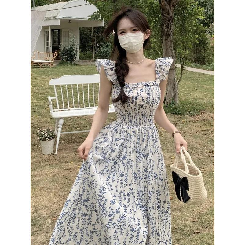 藍色碎花小飛袖吊帶連衣裙女夏季新款時尚小清新收腰顯瘦ins