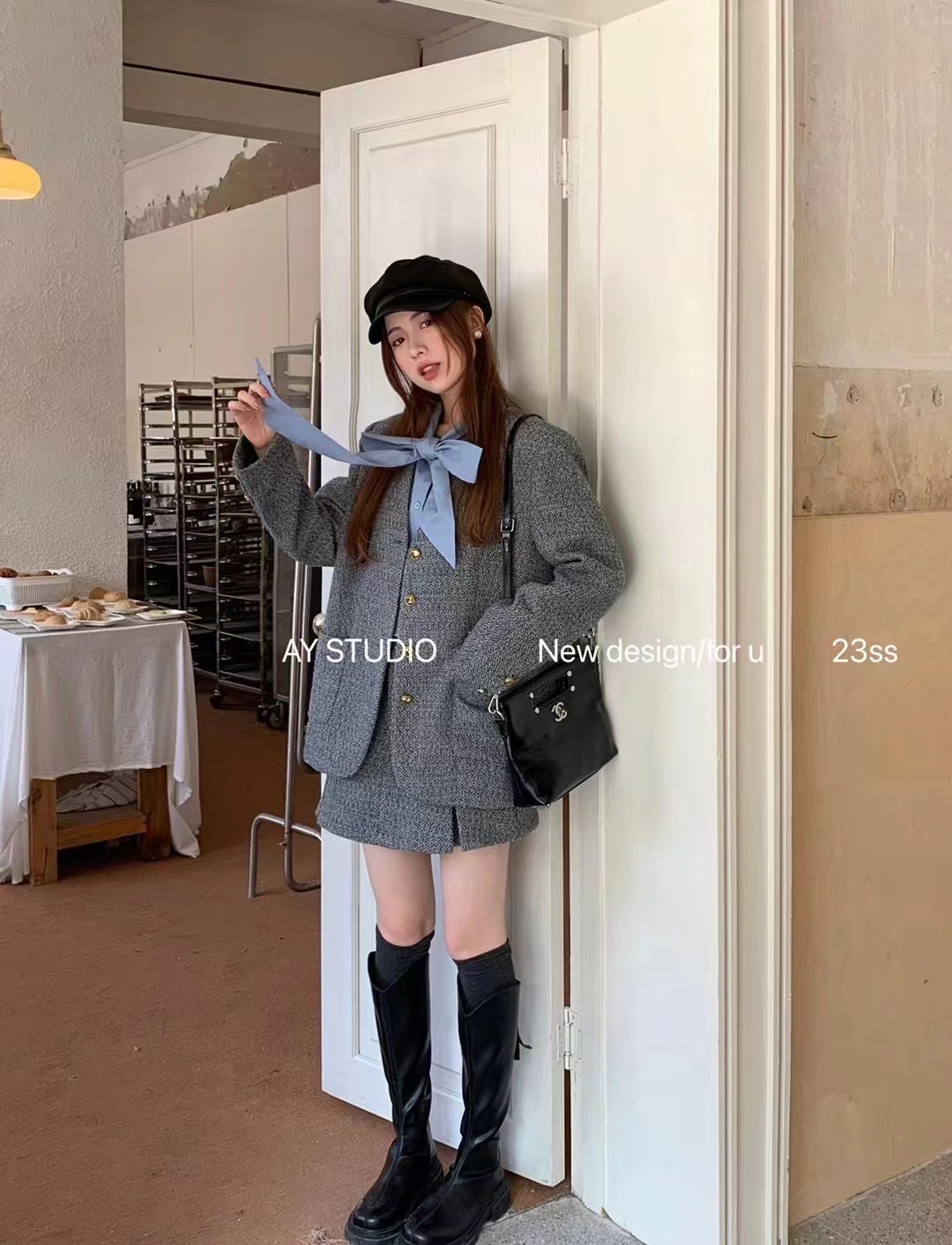 韓版蝴蝶結設計感假兩件羽絨小香風套裝女冬季氣質半身裙兩件套潮