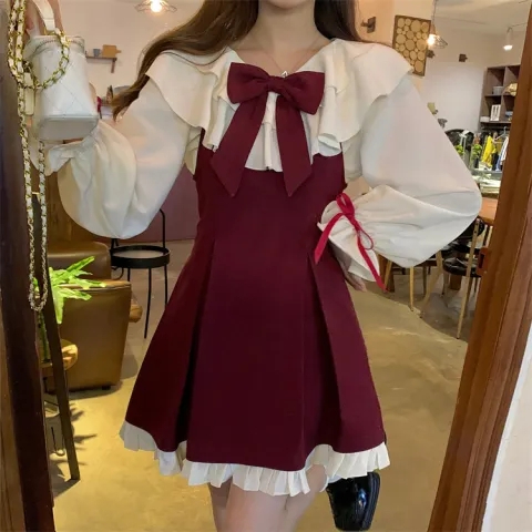 有腰帶公主風新年連衣裙女春秋新款小眾設計感蝴蝶結吊帶短裙