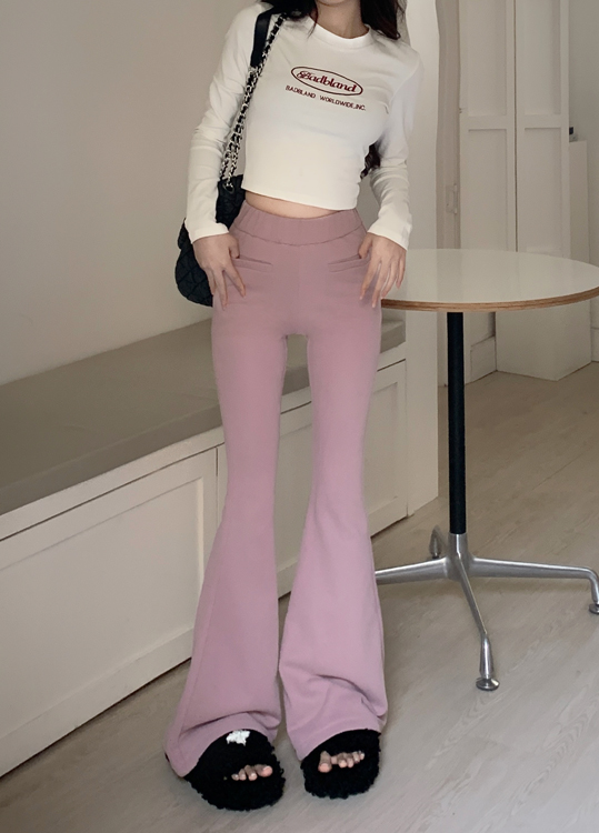 Real shot of high-waisted slimming horse-shoe pants with American design