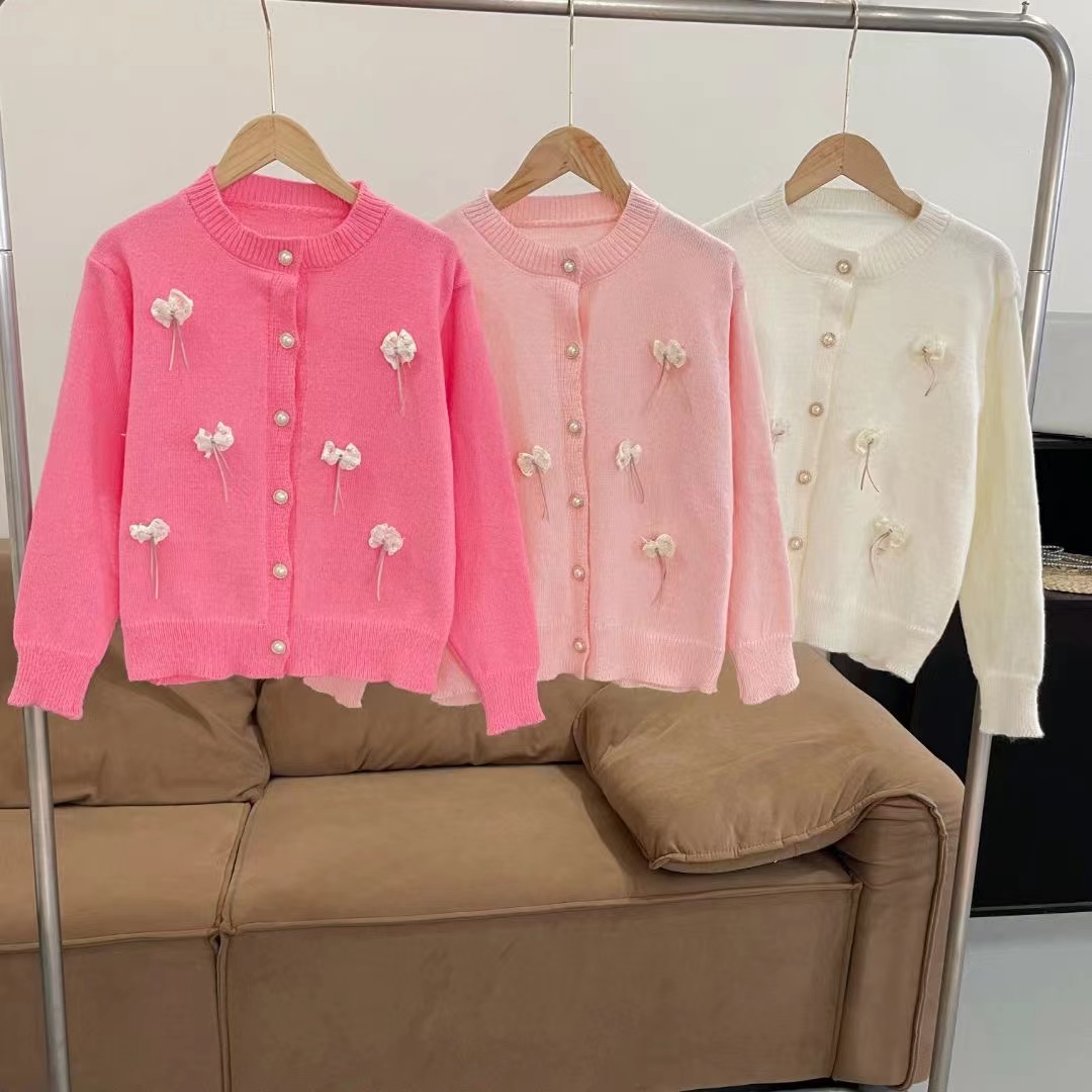 Autumn and winter sweet bow knitted cardigan women's design high-end long-sleeved top loose short sweater jacket