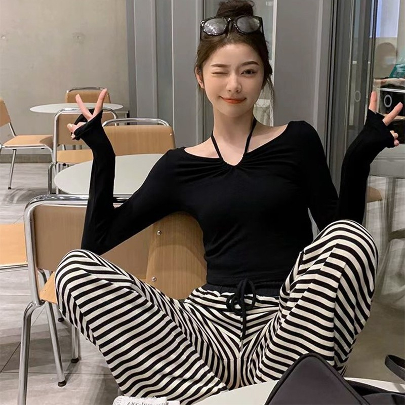 Black v-neck halterneck long-sleeved t-shirt for women in early autumn and winter, bottoming shirt design, niche hot girl top