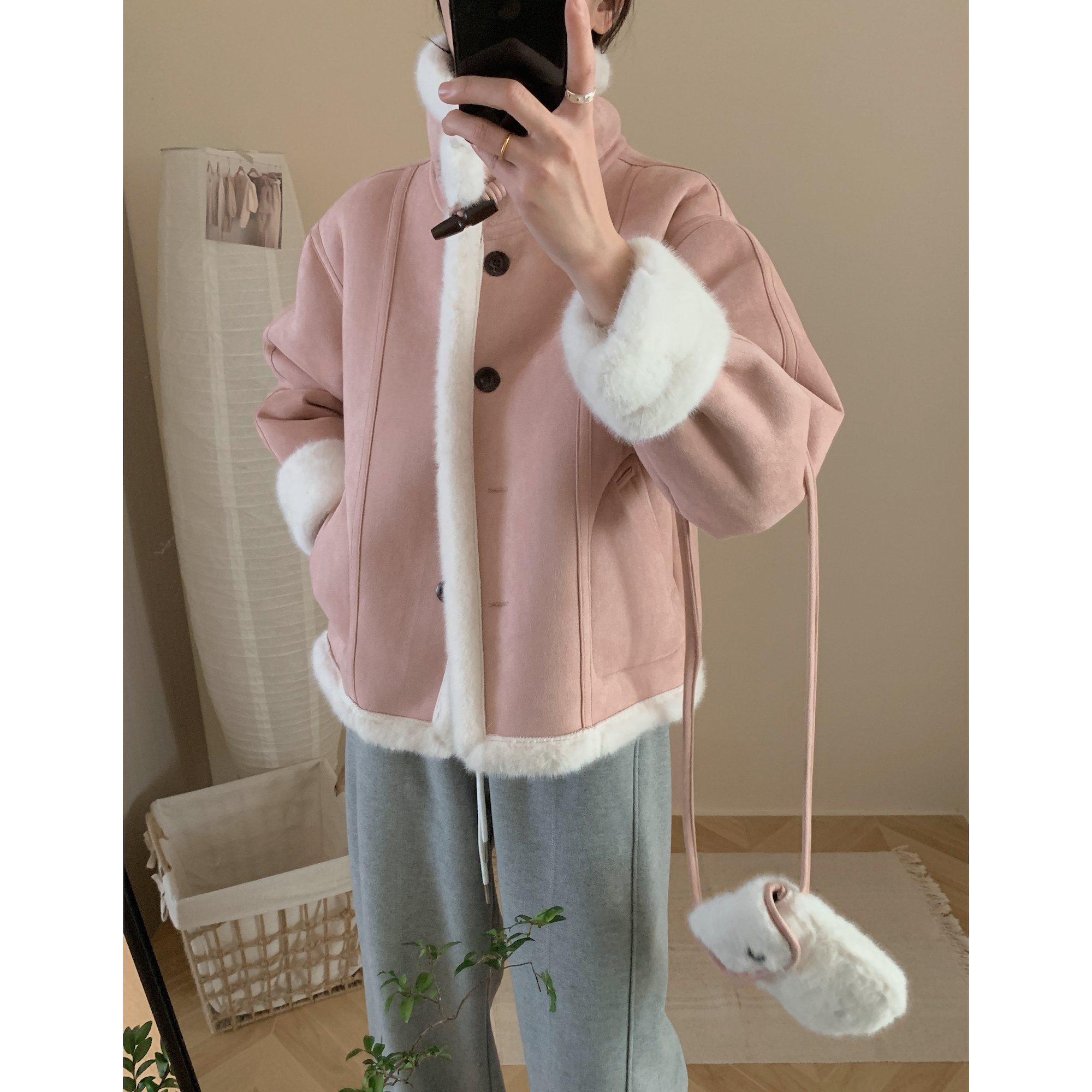 Real shot of warm mink fur all-in-one coat with fur bag