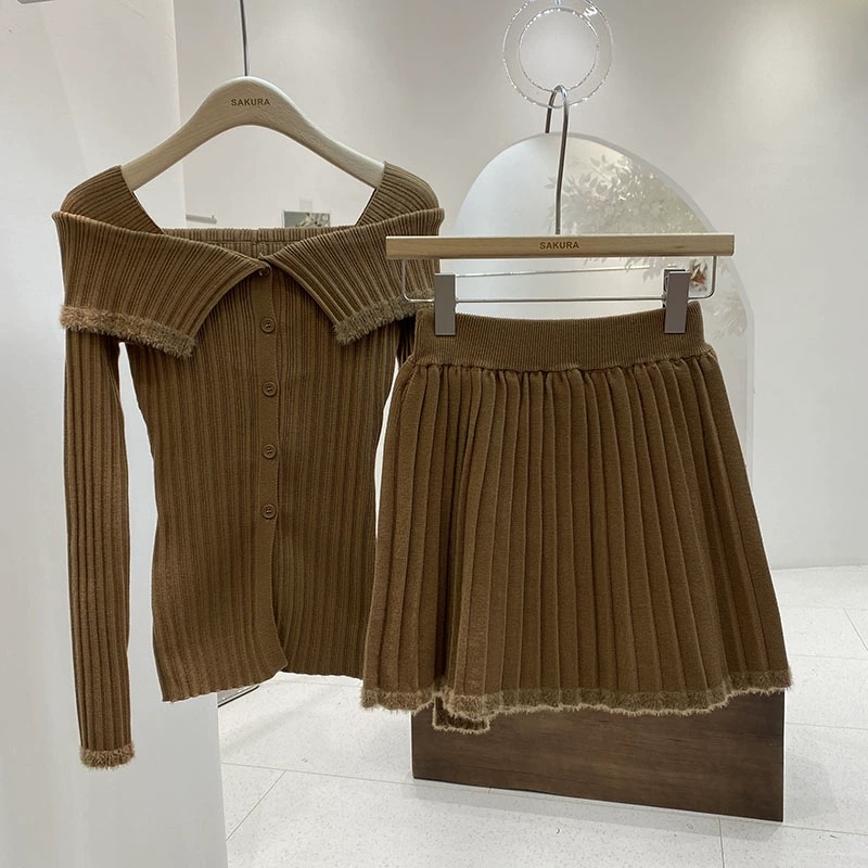 Autumn and winter spliced ​​furry long-sleeved knitted cardigan fashion suit high-waisted pleated skirt lazy women's two-piece set