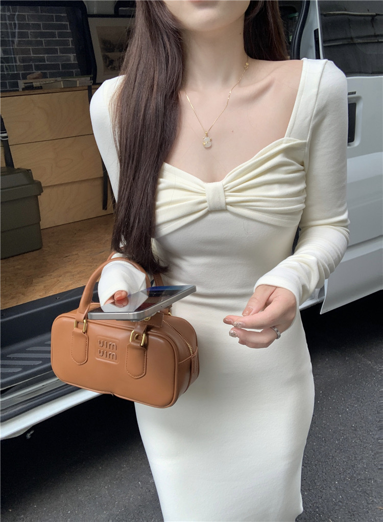 純欲辣妹蝴蝶結褶皺長袖針織連衣裙女裝今年新款春秋季中長裙子