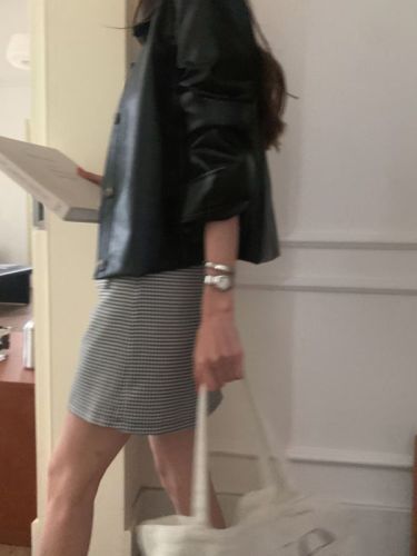 Actual shot of three standard textured leather jacket + plaid skirt two-piece set
