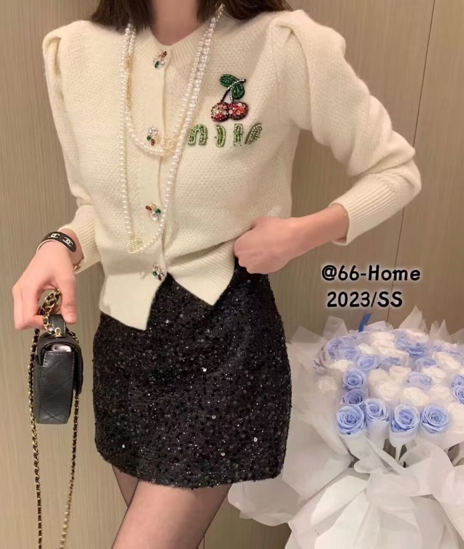 長袖重工手工串珠櫻桃胸針開衫+亮片a字半身裙女包臀絲絨短裙