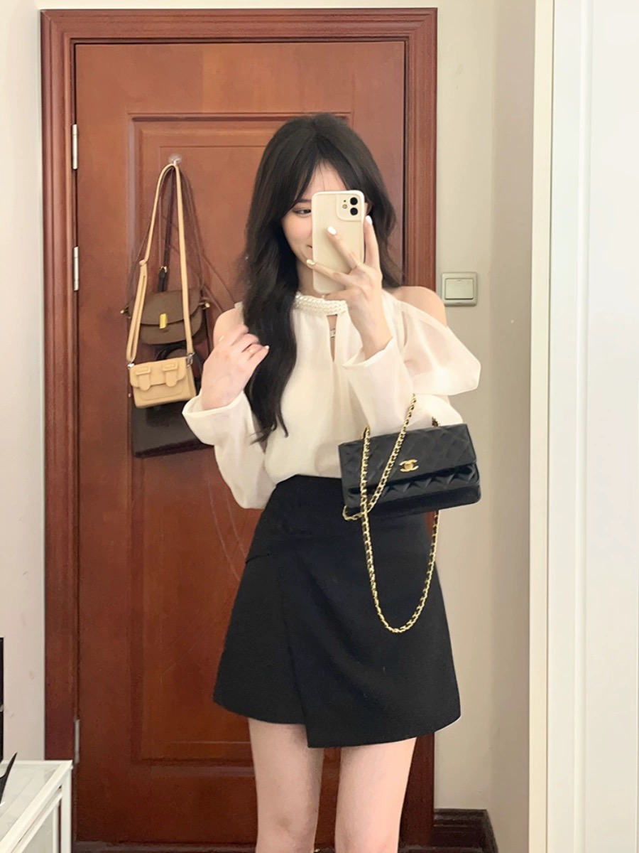法式復古白色挖肩露肩掛脖長袖上衣女春夏寬鬆設計感小眾襯衣襯衫