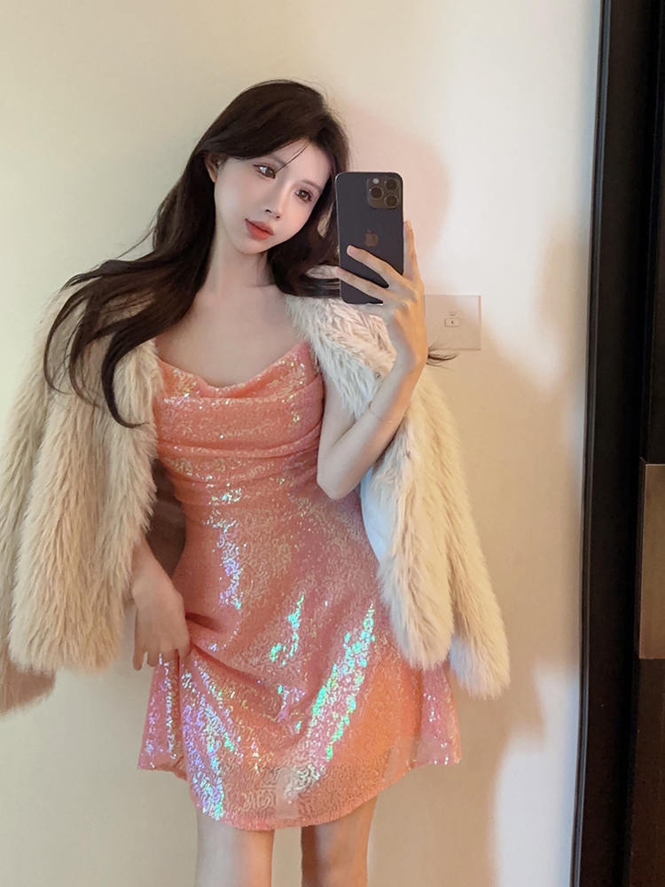 Actual shot of designer heavy sequin suspender dress and short skirt