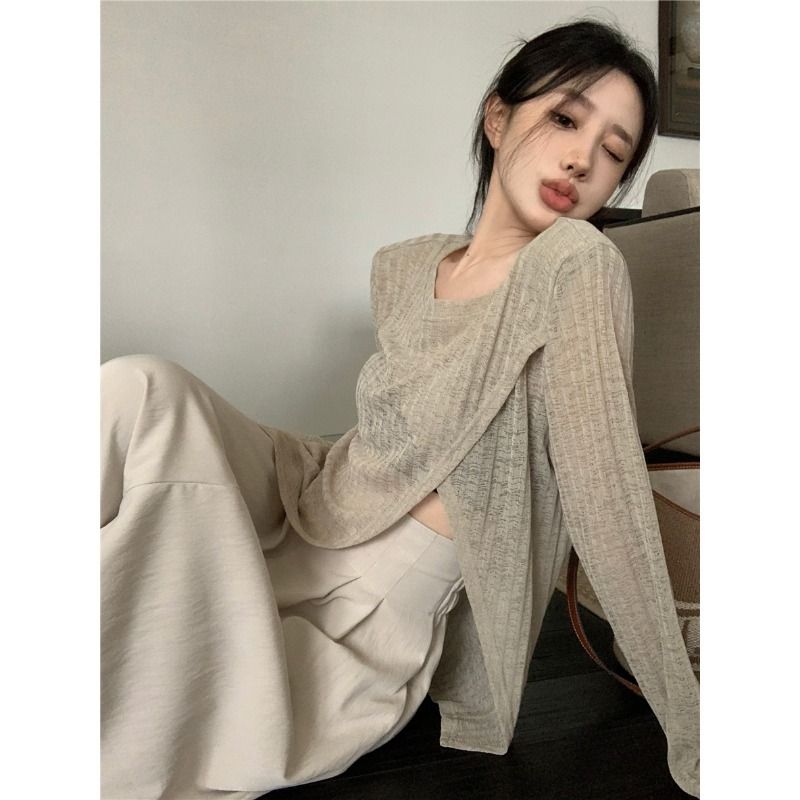 Design sense 2024 new Korean style irregular slit micro-transparent long-sleeved sunscreen women's outer loose and versatile top