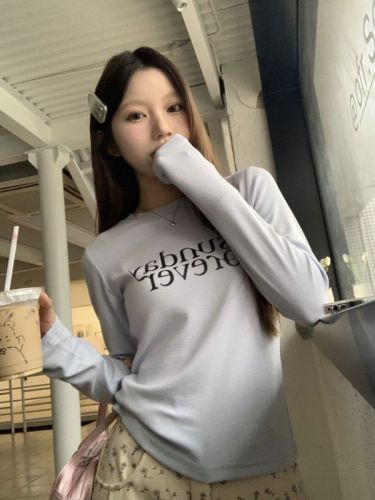 Real shot of three standard casual and versatile round neck printed letter long-sleeved T-shirts for women