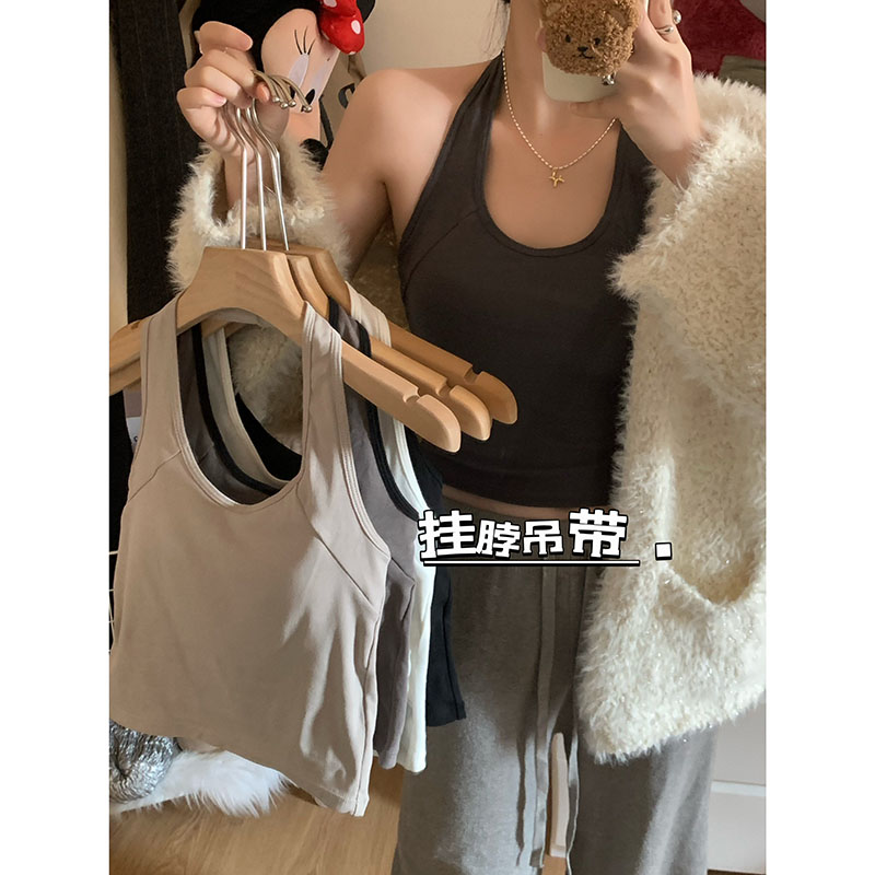 Actual shot of the new hot girl wearing a halterneck camisole, a slim-fitting inner wear and outer wear top with breast pads
