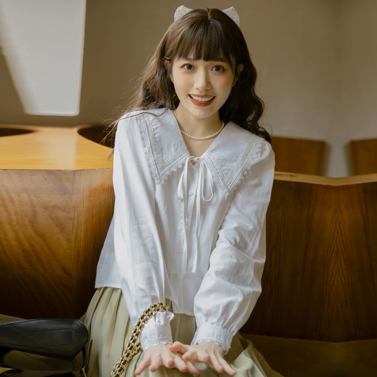 系帶蕾絲花邊藍色娃娃領長袖襯衫女設計感小眾甜美法式別致寸上衣