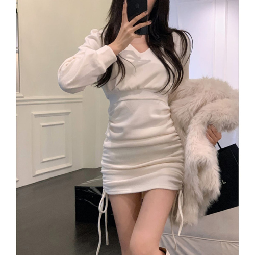 Hollow v-neck white dress for women, sweet and spicy autumn and winter drawstring pleated hip skirt, halter neck, waist slimming short skirt