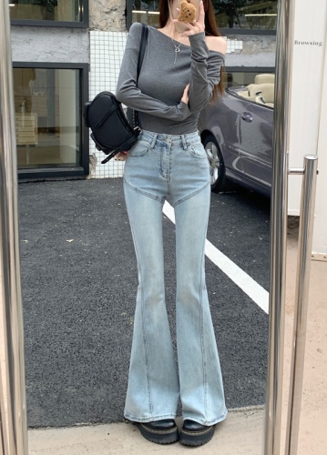 Real shot of high-waisted embroidered stretch hip-lifting bootcut jeans