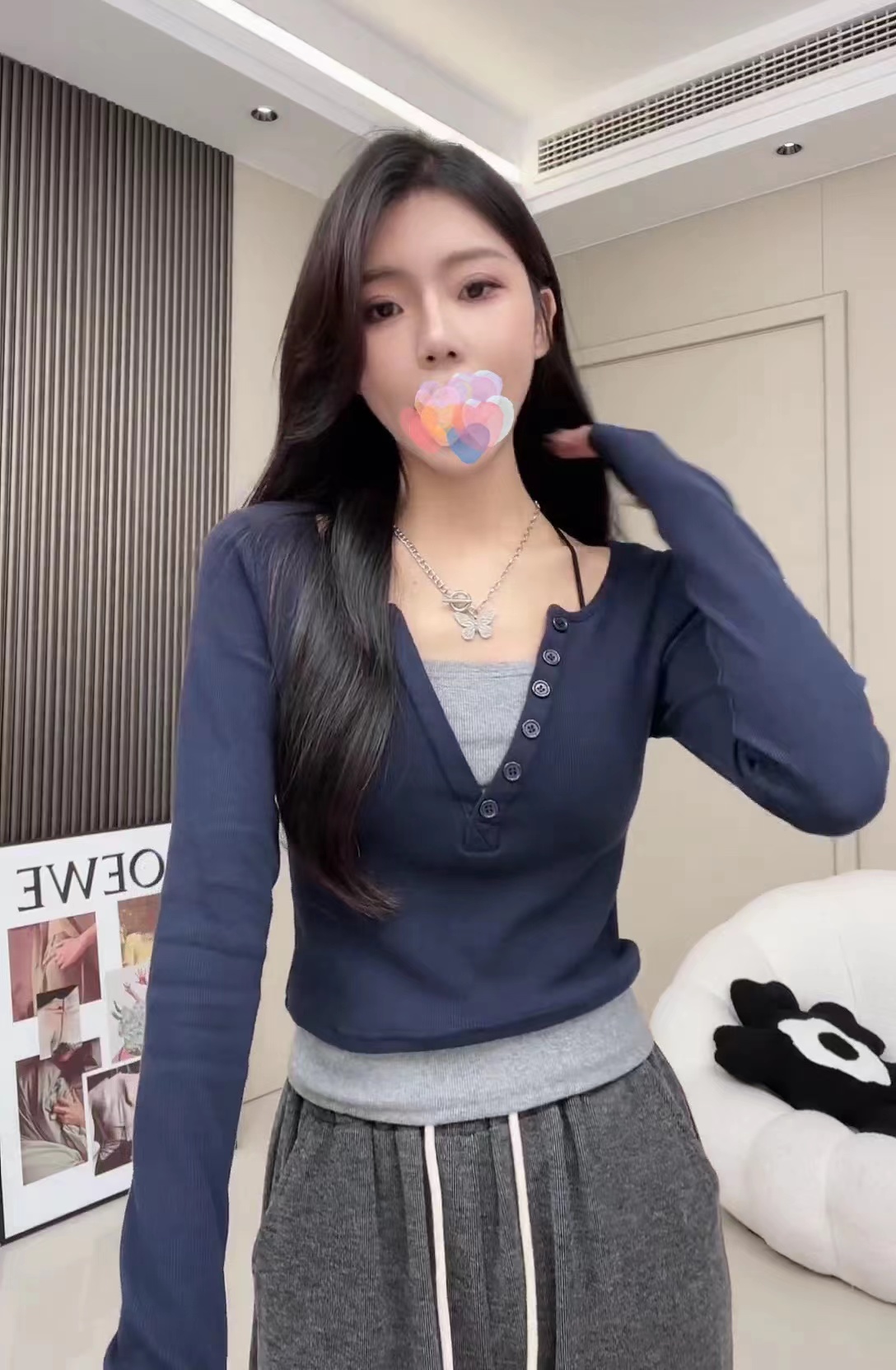 早秋時尚新款小排扣設計感休閒顯瘦長袖女圓領黑白假兩件拼接T恤