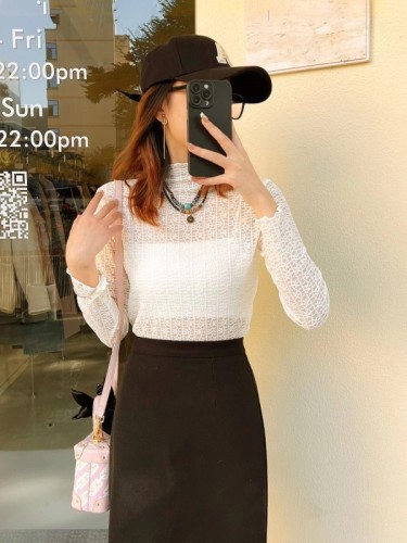 Autumn and winter new Korean style inner fashionable half-high collar slightly see-through patterned ear-edge long-sleeved top for women