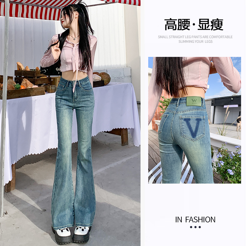 Real shot of nostalgic green denim micro flared pants for women in spring 2024. New back pocket with contrasting letters and flared pants, trendy
