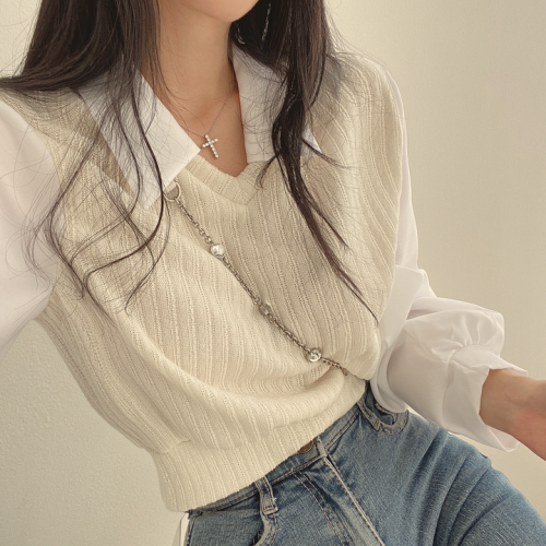 Retro niche French shirt spliced ​​lapel lantern sleeve fake two-piece short knitted top spring new style