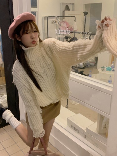 Real shot of new autumn and winter tassel hole design turtleneck sweater for women thickened warm knitted sweater top