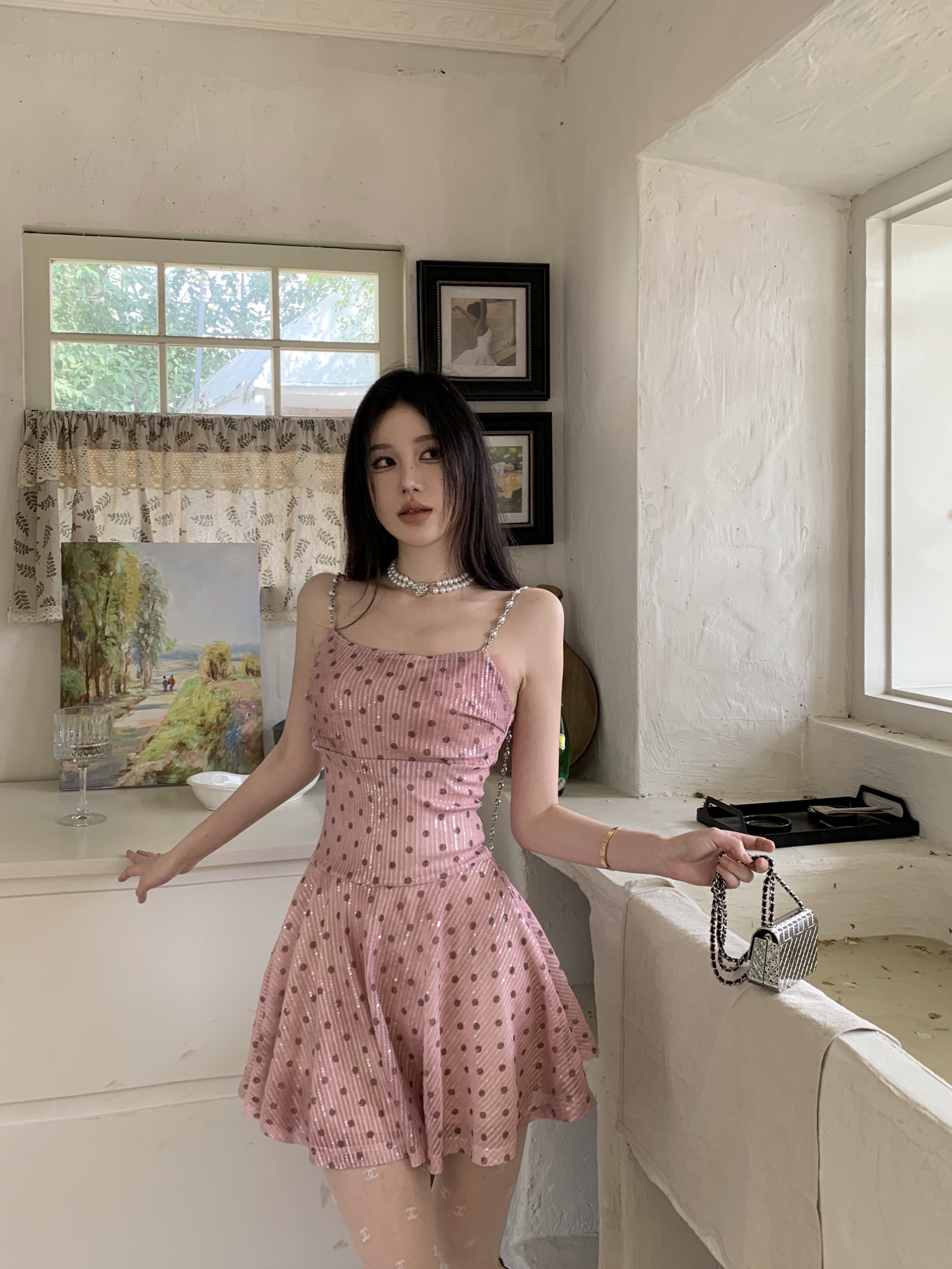 Actual shot of the Magellanic Clouds pink wavy sequins swing collar pearl chain suspender skirt