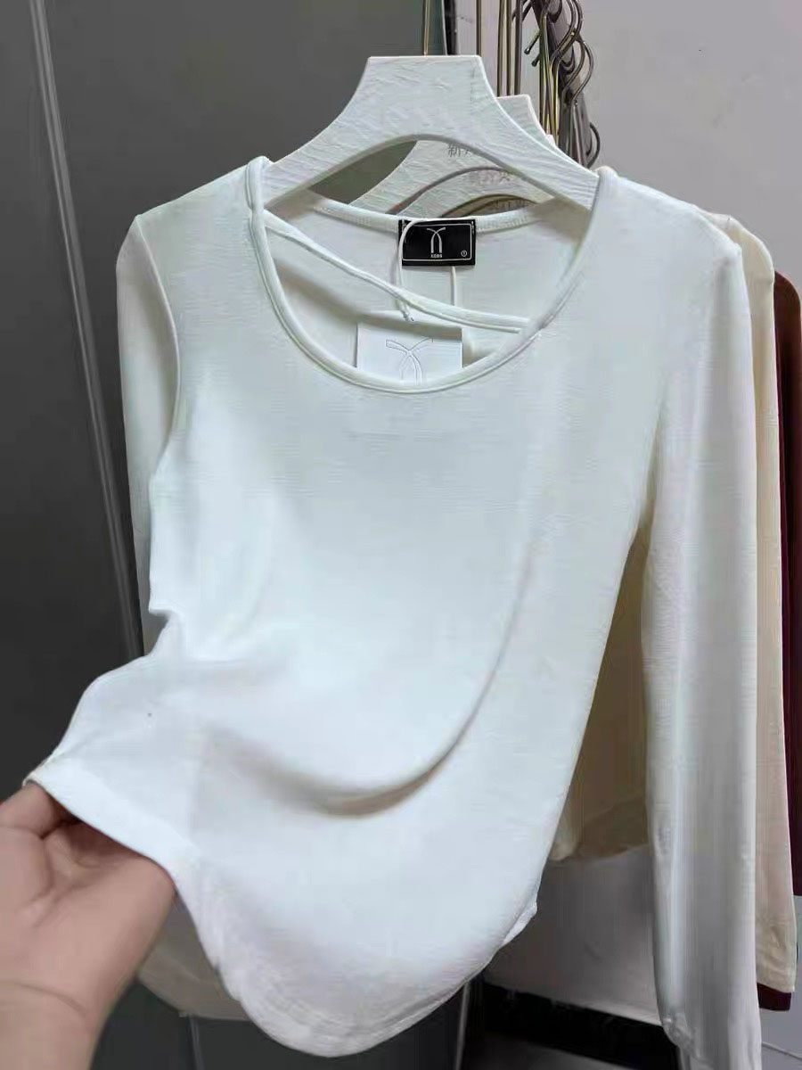 Irregular long-sleeved T-shirt for women 2024 autumn new slim design niche caring shirt short sweet top