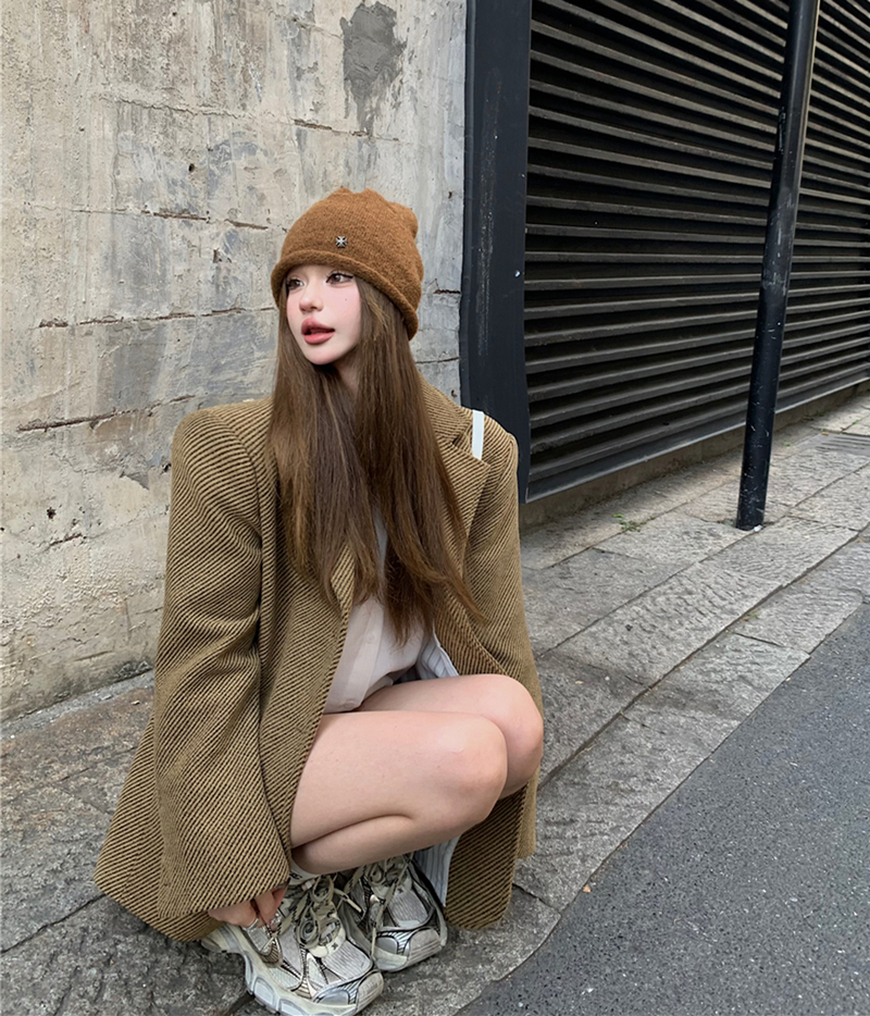 Real shot of retro yellow twill suit, loose woolen coat and cotton coat for women