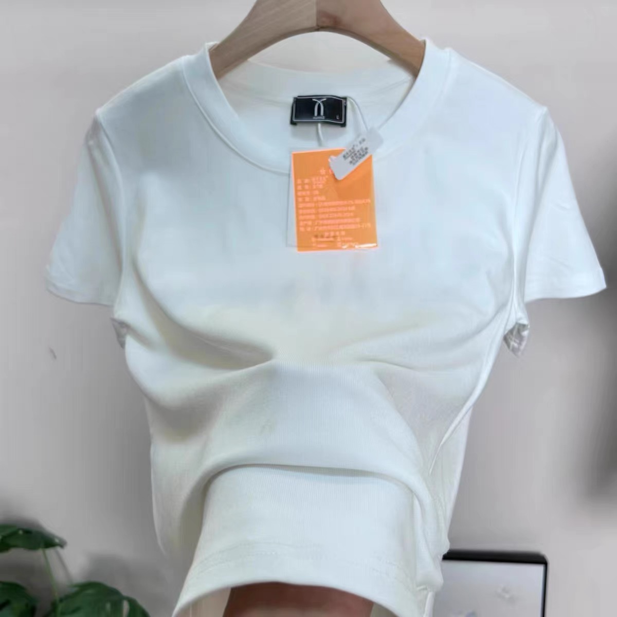 Round neck irregular hem short T-shirt 2024 summer new arrival side pleats slimming design top for women
