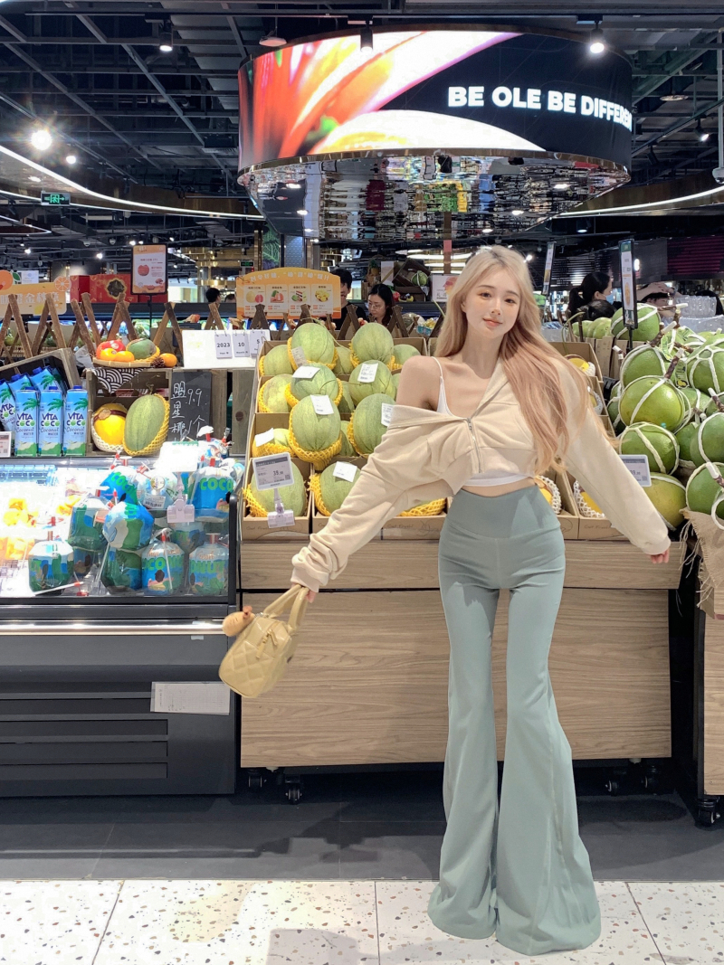 Real shot of hot girl's sexy short waisted cardigan hooded + flared yoga pants to make her look taller and slimmer shark pants