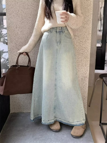 Retro raw edge denim skirt for women in winter, small, high-waisted and slim, versatile mid-length A-line long skirt with large hem