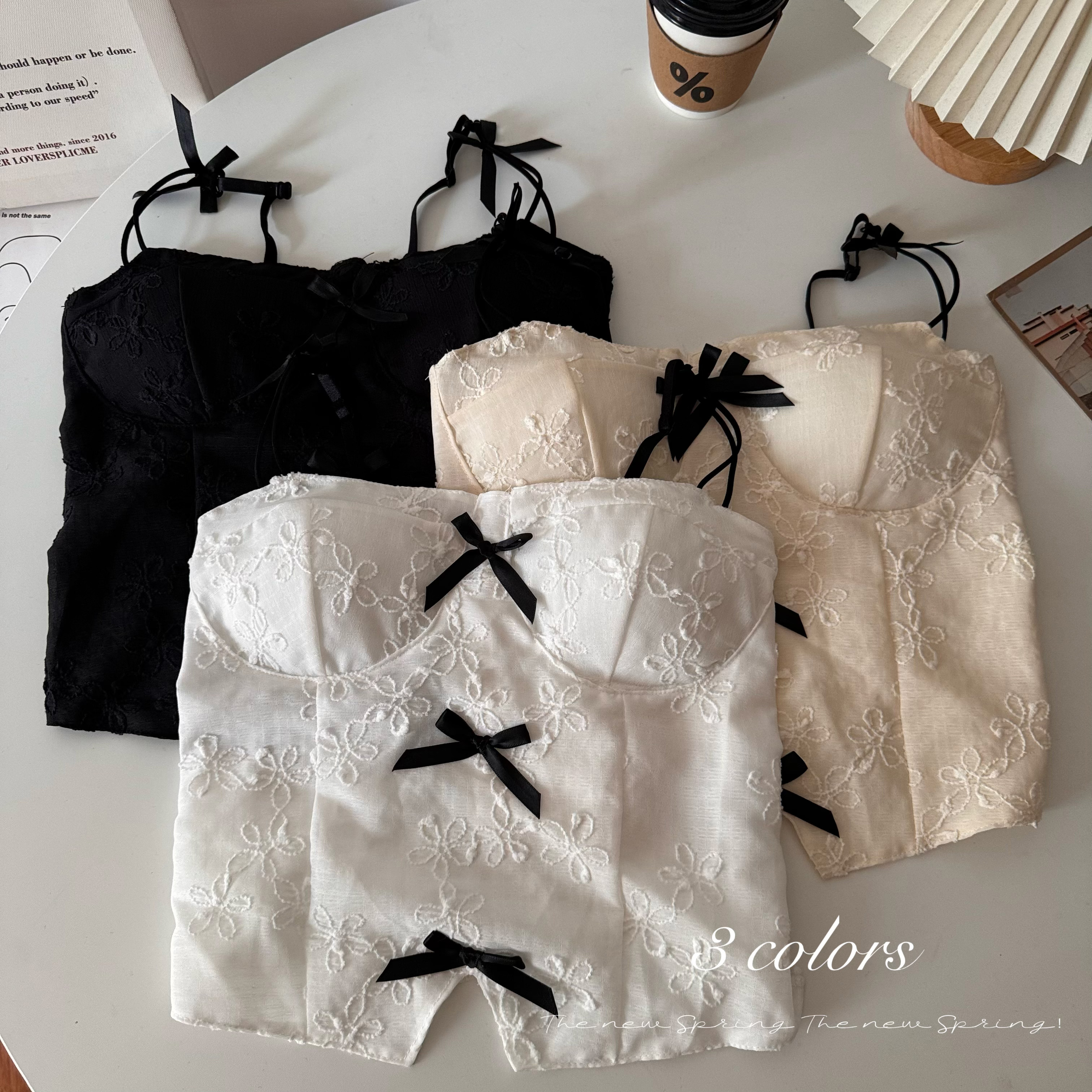 Real shot of the 2024 spring sweet bow camisole vest for women wearing Korean style spicy girl top
