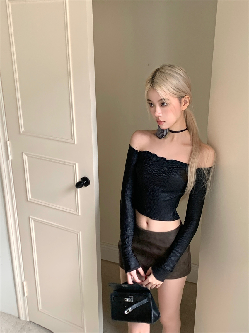 Real shot of a hot girl with pure lusty one-shoulder long-sleeved T-shirt top