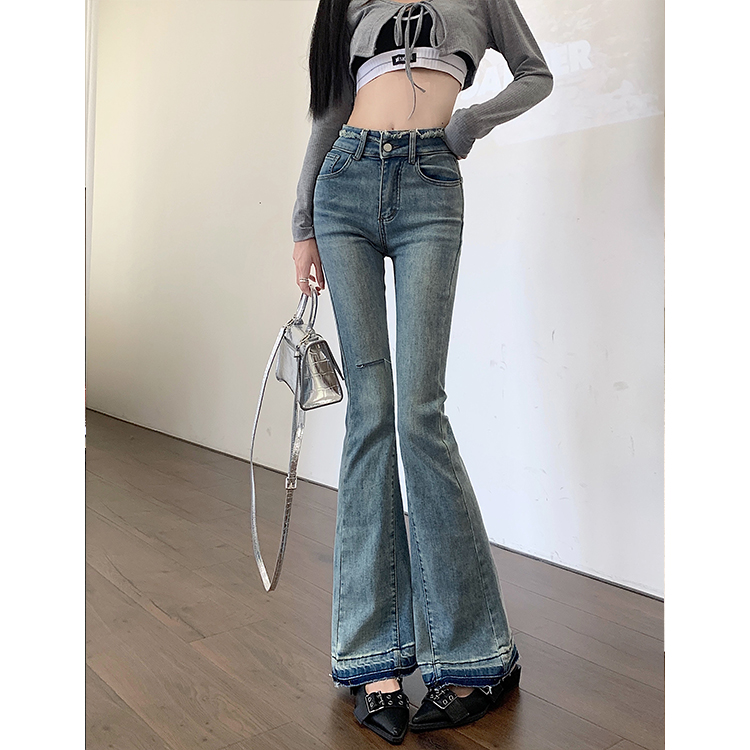 Actual shot of stretchy ripped raw edge jeans for women