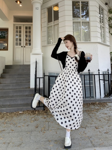 Real shot of fashionable and high-end waist slimming suspender dress with design polka dot knitted cardigan two-piece set