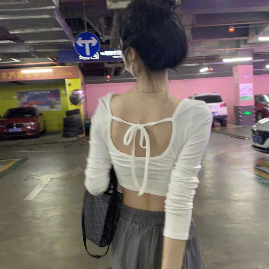 Has been shipped Korean simple style T-shirt for women spring new sexy slim short style leaky back design top for women
