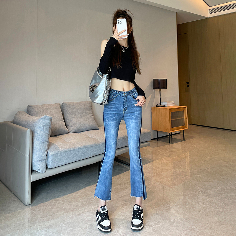 實拍2024早春時尚港風高腰做舊流蘇毛邊彈力微喇牛仔褲女