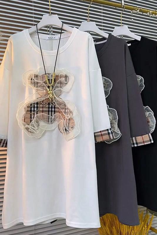 Mid-length dress that covers the flesh and looks slimming. Fashionable cartoon mid-length dress that covers the flesh and looks slimming.