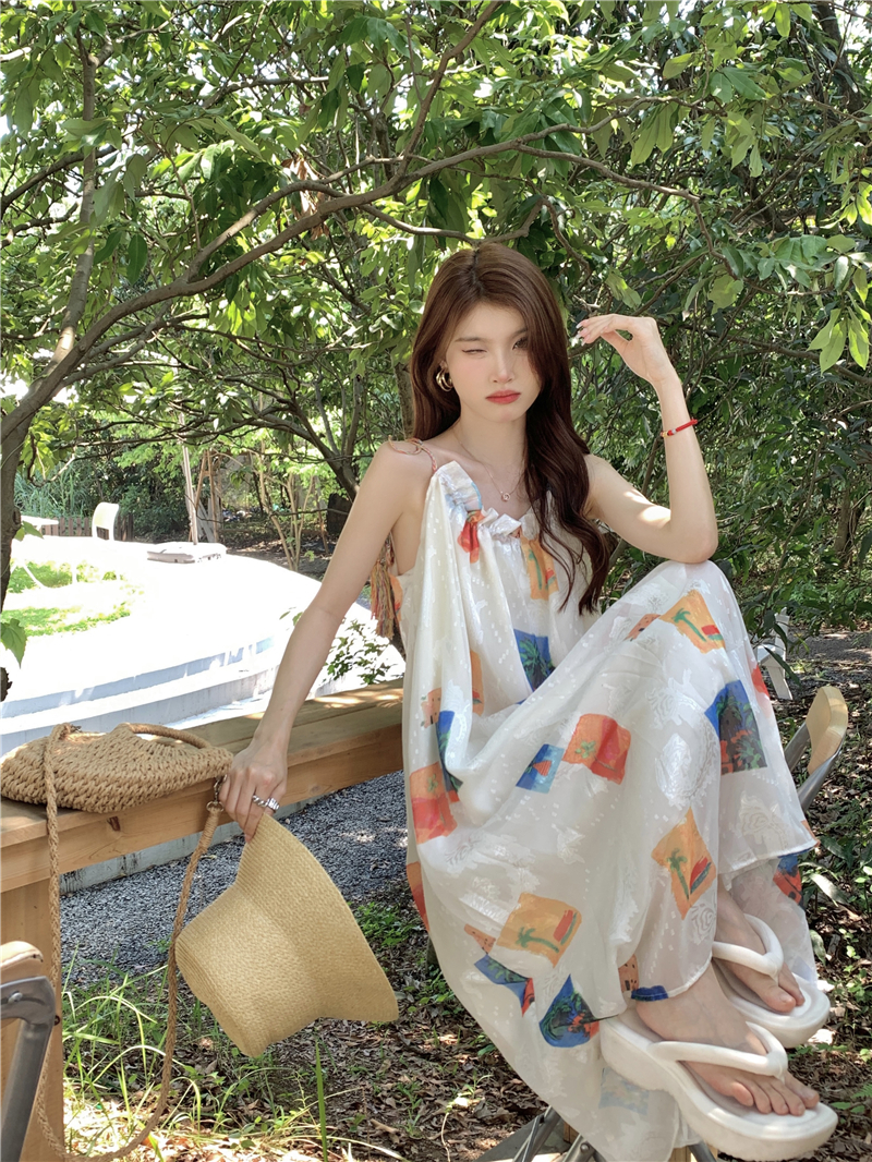 實拍茶歇法式高級海邊度假碎花吊帶連衣裙夏超仙寬鬆沙灘長裙